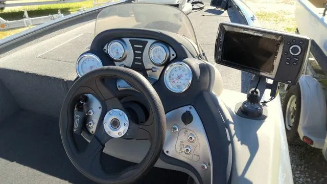 Slide: The Image of Steering console of 2016 Tracker Pro Team™ 190 TX boat with gauges and fishfinder. - 8