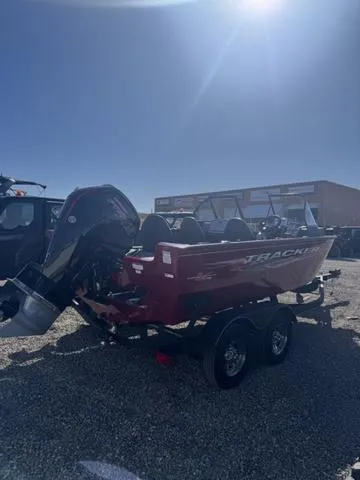 Slide: The Image of 2023 Tracker Pro Guide™ V-175 WT boat on trailer under bright sunlight. - 5