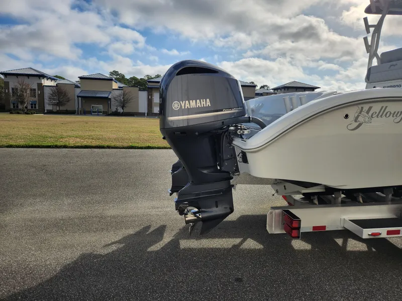 Slide: The Image of 2017 Yellowfin 34 Offshore boat with Yamaha outboard motor on a trailer. - 10