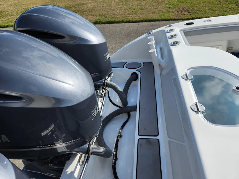 Slide: The Image of 2017 Yellowfin 34 Offshore boat with dual outboard engines, rear deck view. - 25