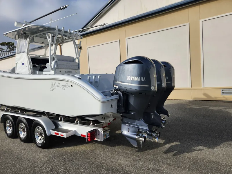 Slide: The Image of 2017 Yellowfin 34 Offshore boat with Yamaha engines on a trailer. - 3