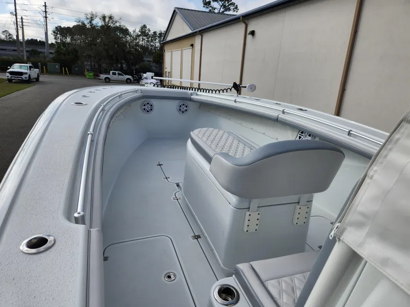 Slide: The Image of 2017 Yellowfin 34 Offshore boat interior with seating and storage compartments. - 43
