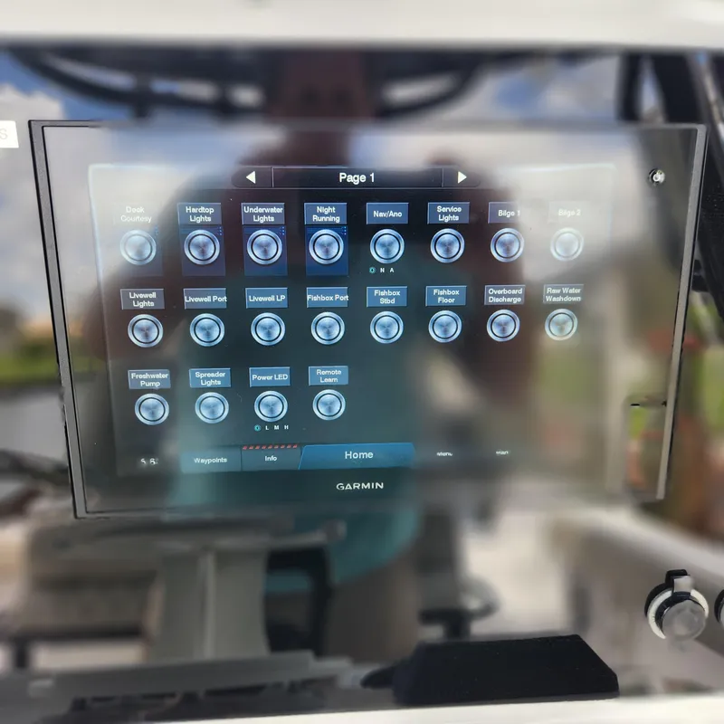 Slide: The Image of Garmin touchscreen display on 2021 Sportsman Open 252 Center Console boat. - 17