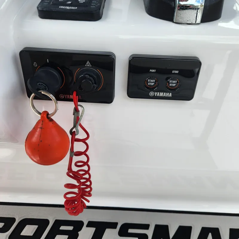 Slide: The Image of Control panel of 2021 Sportsman Open 252 Center Console boat with Yamaha ignition system. - 20