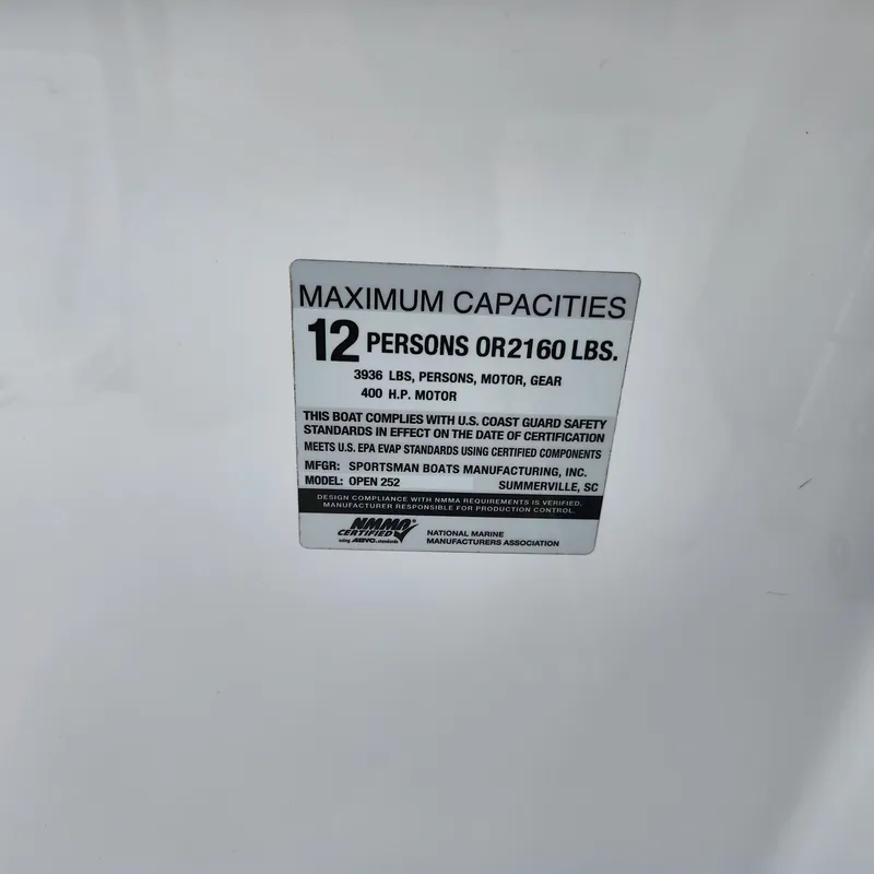 Slide: The Image of Capacity label on 2021 Sportsman Open 252 Center Console, max 12 persons or 2160 lbs. - 25