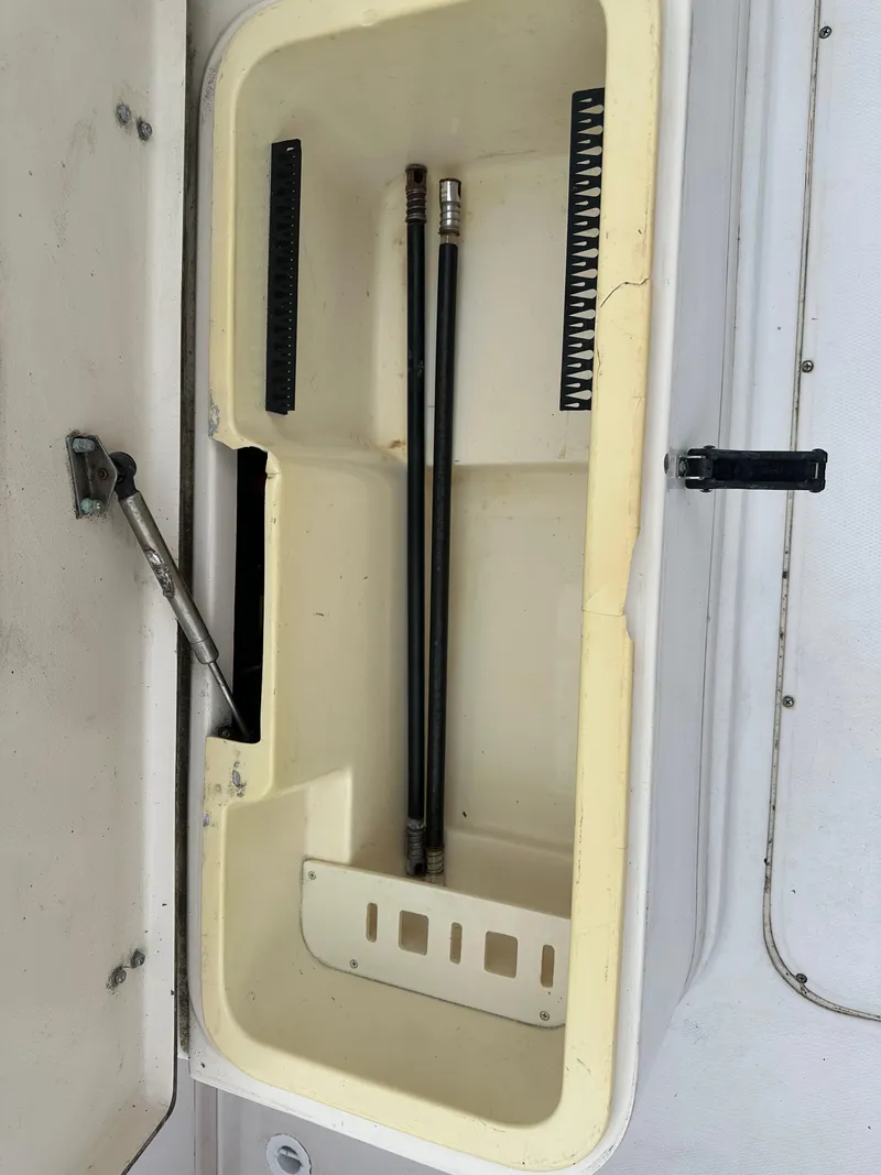 Slide: The Image of Open storage compartment on a 2001 Grady-White Sailfish 282 boat. - 14