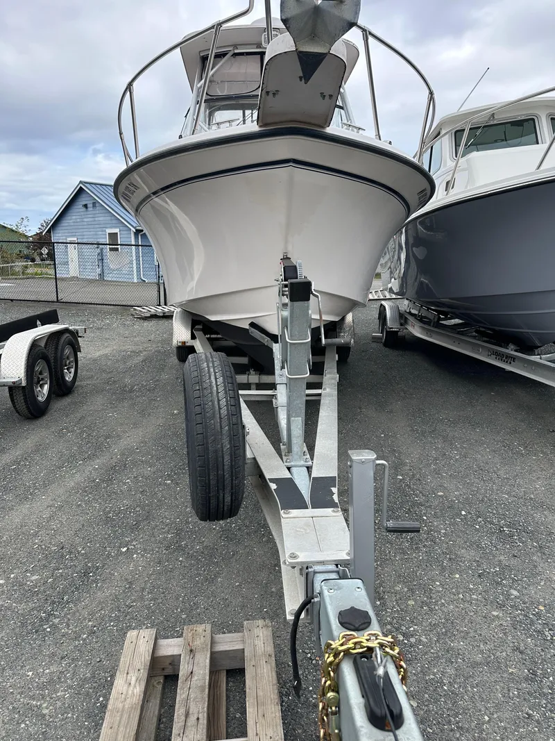 Slide: The Image of 2001 Grady-White Sailfish 282 boat on trailer, parked outdoors. - 39