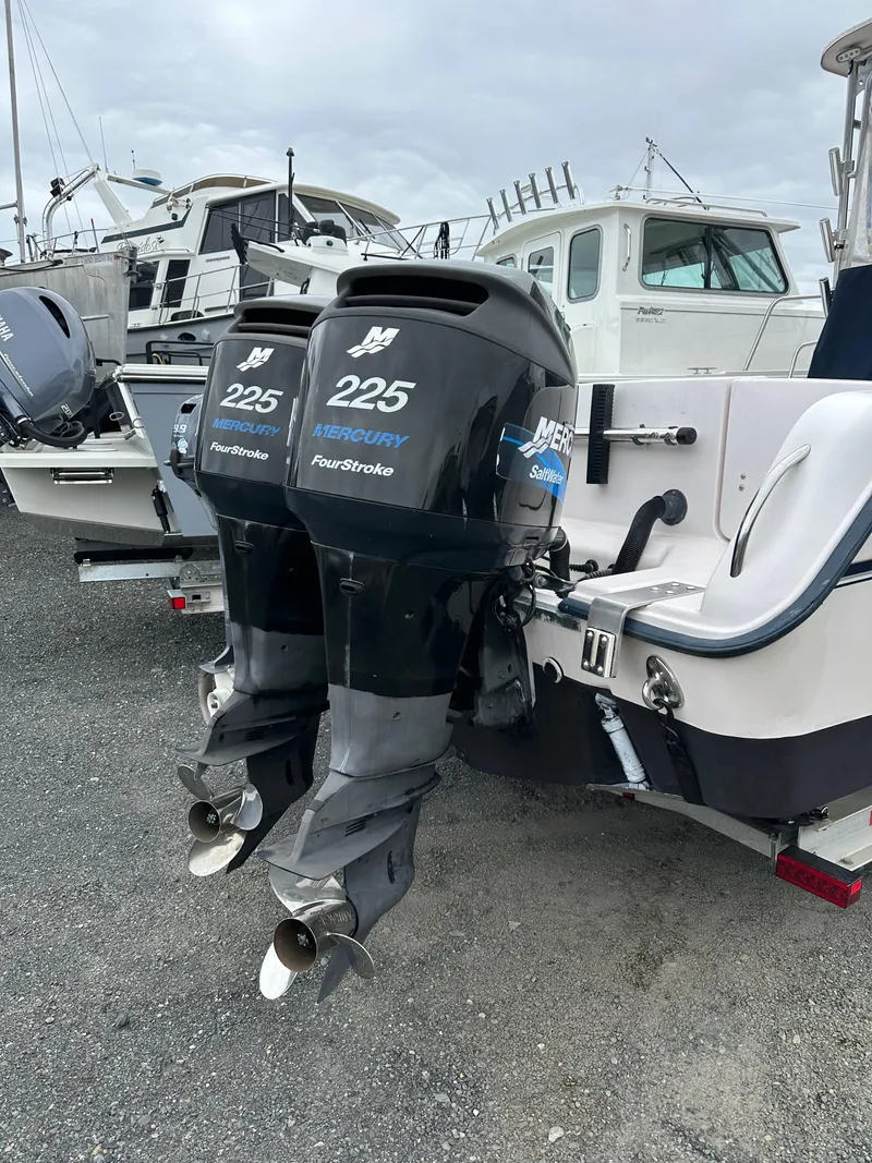 Slide: The Image of 2001 Grady-White Sailfish 282 with twin 225 horsepower outboard motors. - 5