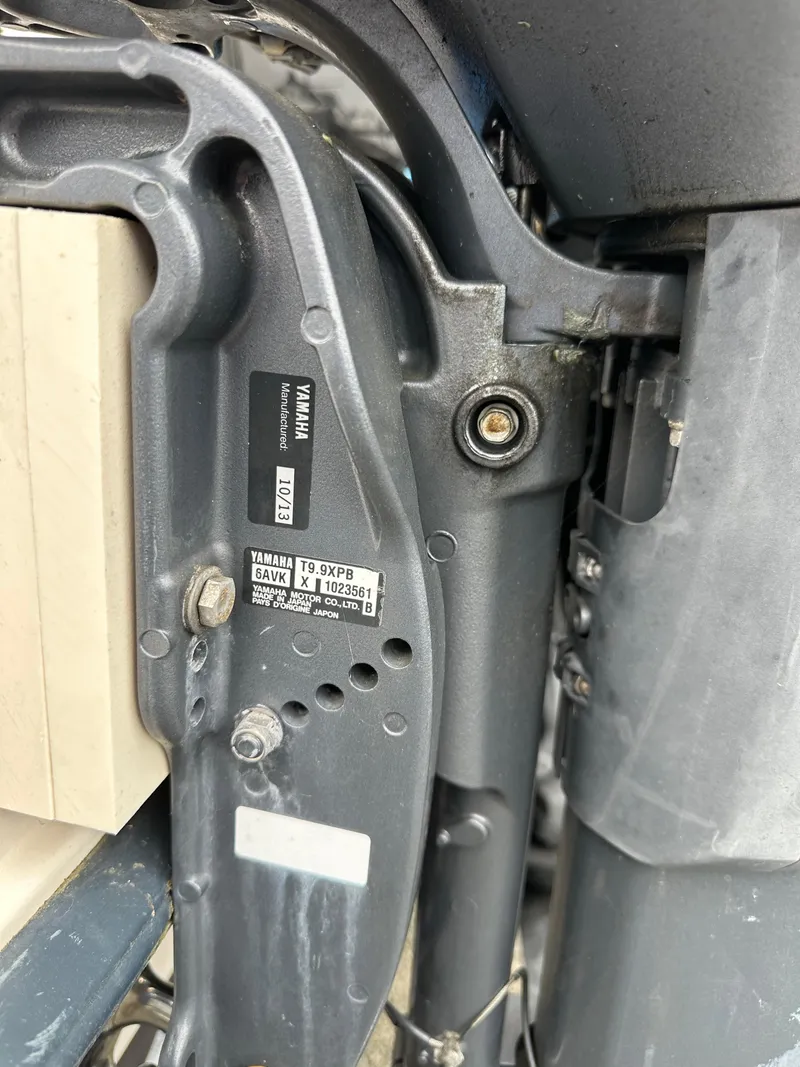 Slide: The Image of Close-up of a 2001 Grady-White Sailfish 282 boat engine component. - 8