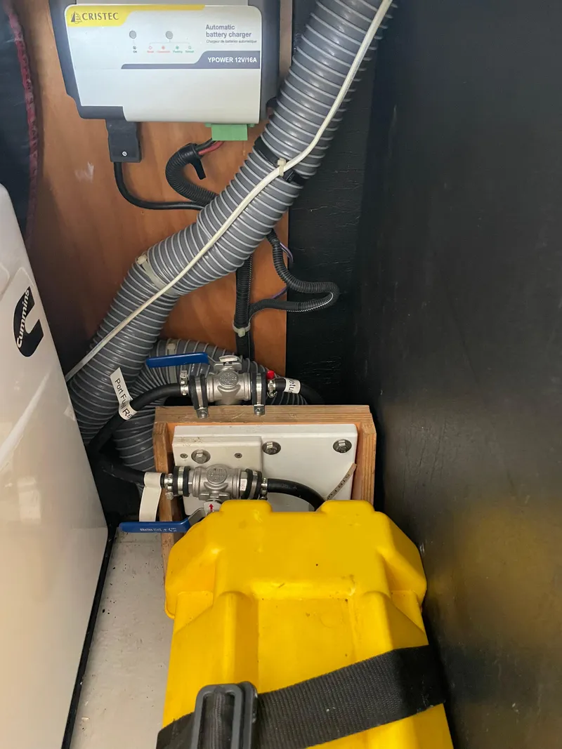 Slide: The Image of Electrical and plumbing components inside a 2016 Lagoon 450 F yacht. - 19