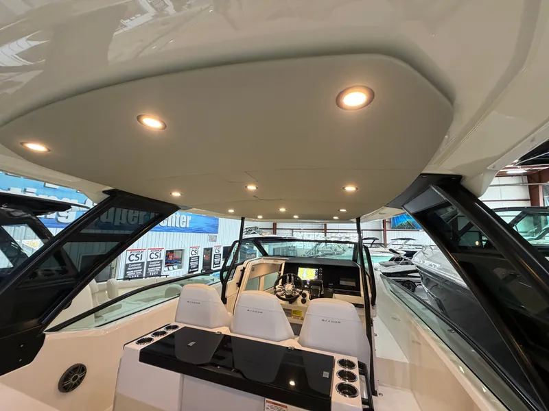 Slide: The Image of Interior view of a 2026 Saxdor 320 GTO with modern cockpit and lighting. - 36