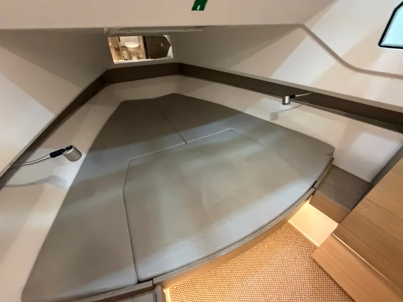 Slide: The Image of Interior of the Saxdor 320 GTO featuring a cozy sleeping cabin and modern design. - 21