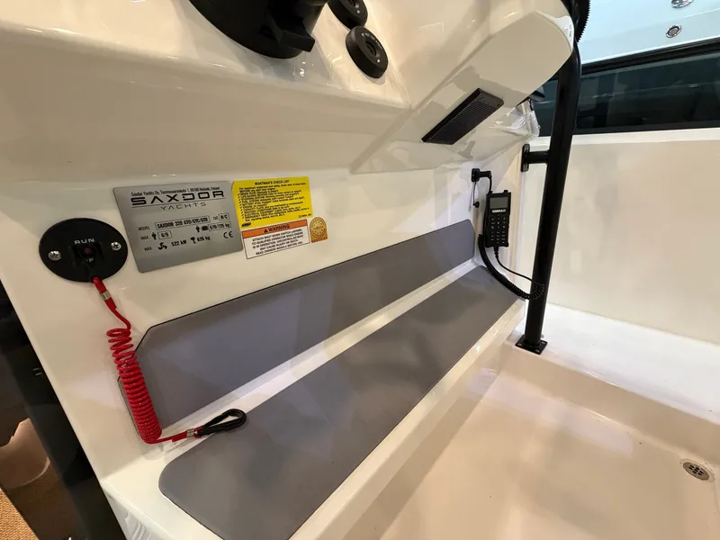Slide: The Image of Interior view of a Saxdor 320 GTO with gray padding and control elements. - 13