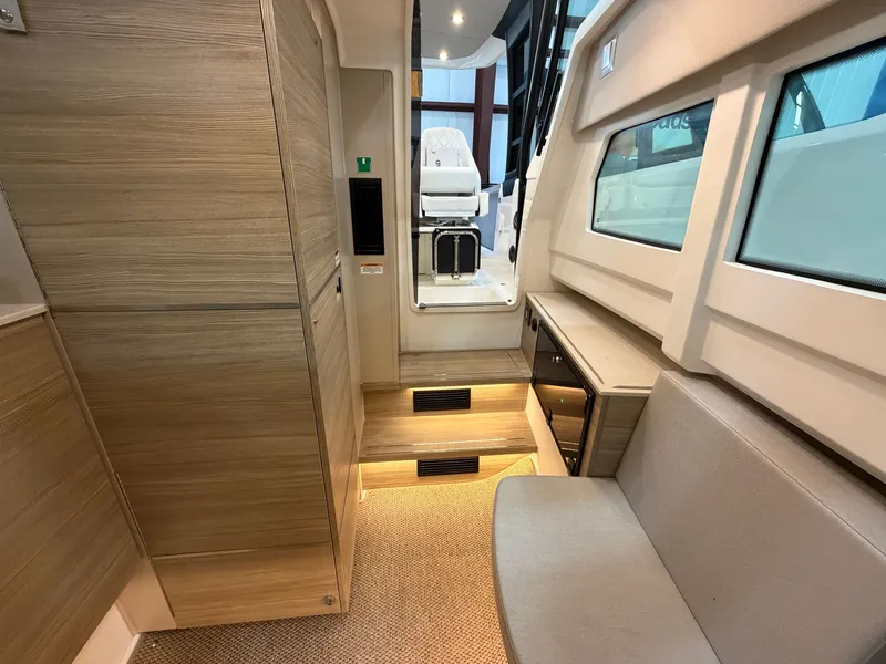 Slide: The Image of Interior of the Saxdor 320 GTO with wood paneling and comfortable seating. - 35