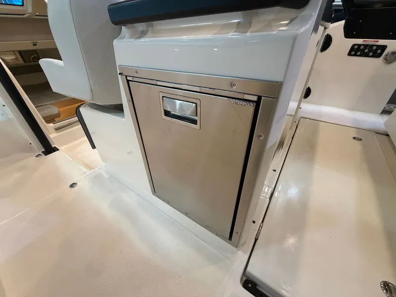 Slide: The Image of The interior of the 2026 Saxdor 320 GTO features a built-in refrigerator. - 40