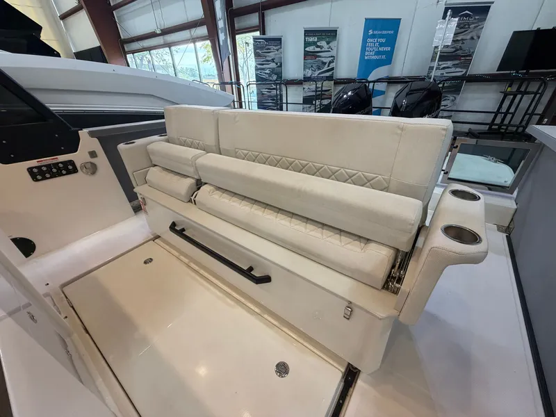 Slide: The Image of The 2026 Saxdor 320 GTO features an elegant, cushioned bench seat with cup holders. - 43