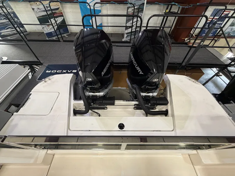 Slide: The Image of Two Mercury outboard engines on a Saxdor 320 GTO boat. - 32