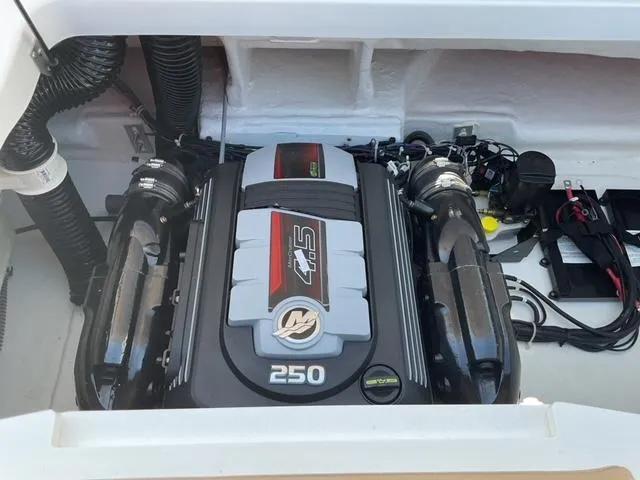 Slide: The Image of 2025 Bayliner V20i engine compartment with powerful 250 horsepower motor. - 13