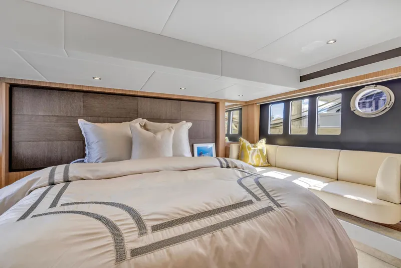 Slide: The Image of Luxurious bedroom interior of 2018 Absolute 52 FLY yacht with elegant bedding and seating. - 29