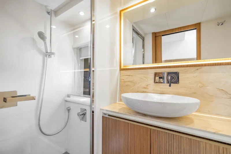 Slide: The Image of Luxurious bathroom in 2018 Absolute 52 FLY yacht with modern fixtures and elegant design. - 32