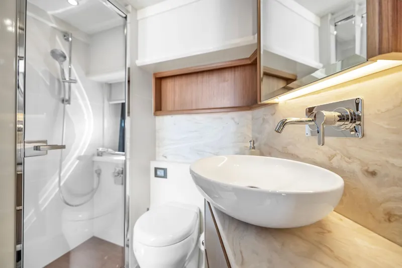 Slide: The Image of Luxurious bathroom in 2018 Absolute 52 FLY yacht with modern fixtures and elegant design. - 35