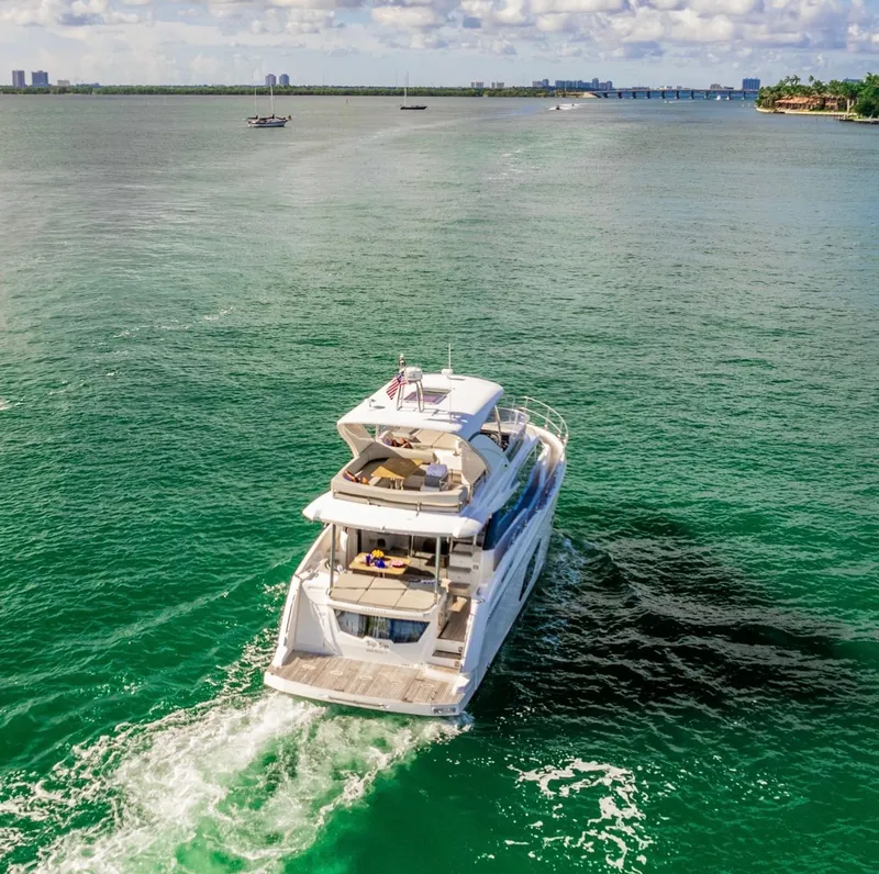 Slide: The Image of Luxury yacht Absolute 52 FLY cruising on open water, 2018 model. - 4