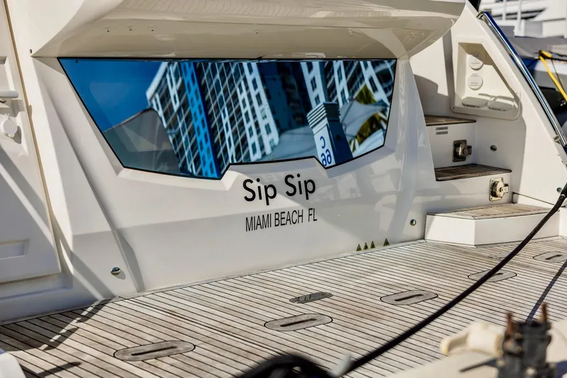 Slide: The Image of 2018 Absolute 52 FLY yacht, "Sip Sip," docked in Miami Beach, FL. - 6
