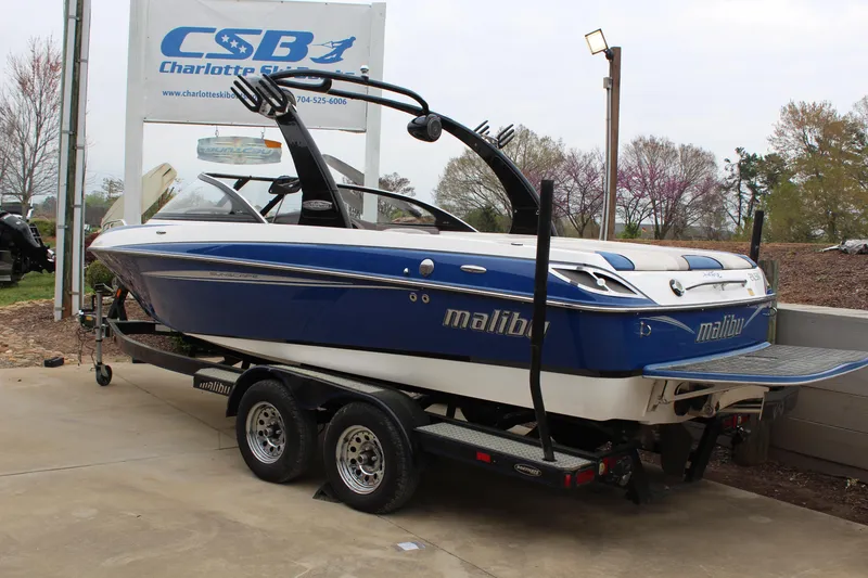 Slide: The Image of 2006 Malibu Sunscape 21 LSV boat on trailer at dealership. - 3