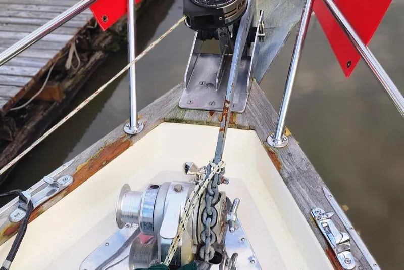 Slide: The Image of Bow of 1984 Clearwater Cutter with anchor chain and winch system. - 19