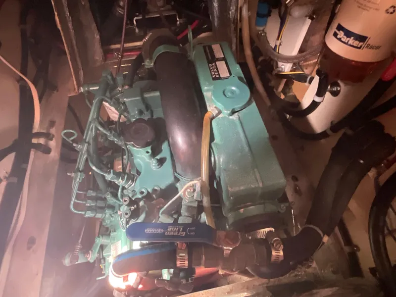 Slide: The Image of Engine room of 1984 Clearwater CUTTER with visible components and Parker filter. - 27