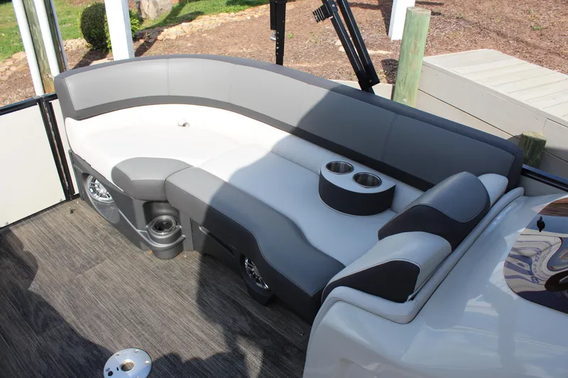 Slide: The Image of 2023 Tahoe Pontoon Cascade Platinum Versatile Rear Bench with sleek seating and cup holders. - 12