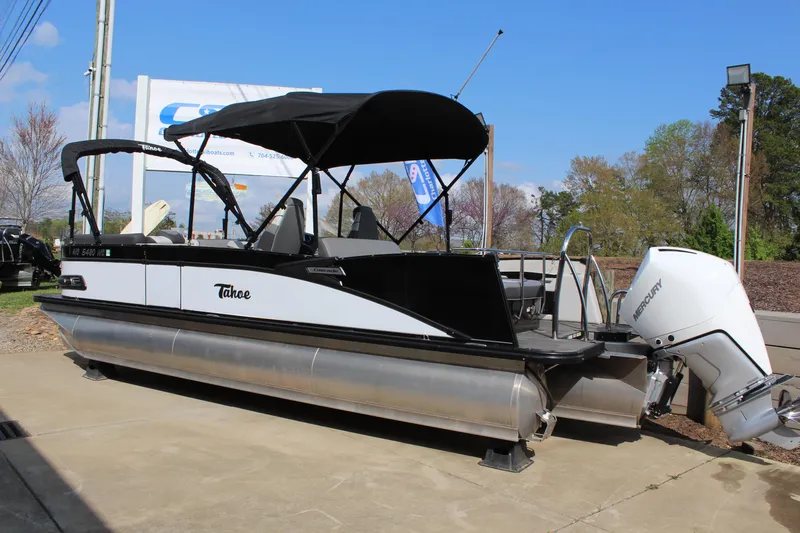 Slide: The Image of 2023 Tahoe Pontoon Cascade Platinum Versatile Rear Bench 23' with canopy and outboard motor. - 3