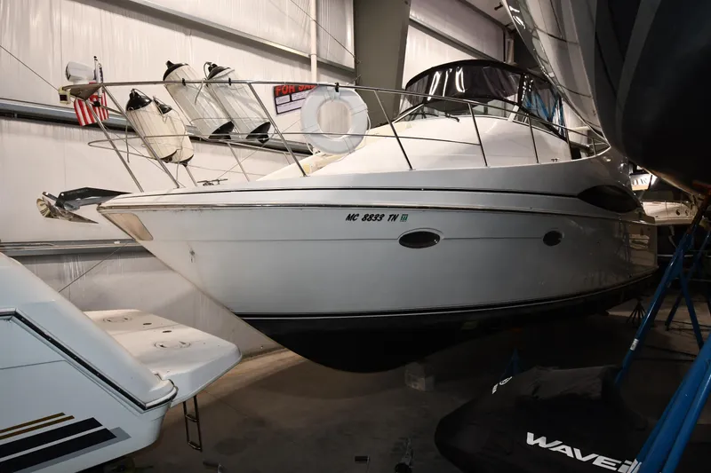 Slide: The Image of 2000 Carver 350 Mariner yacht in indoor storage, side view. - 0