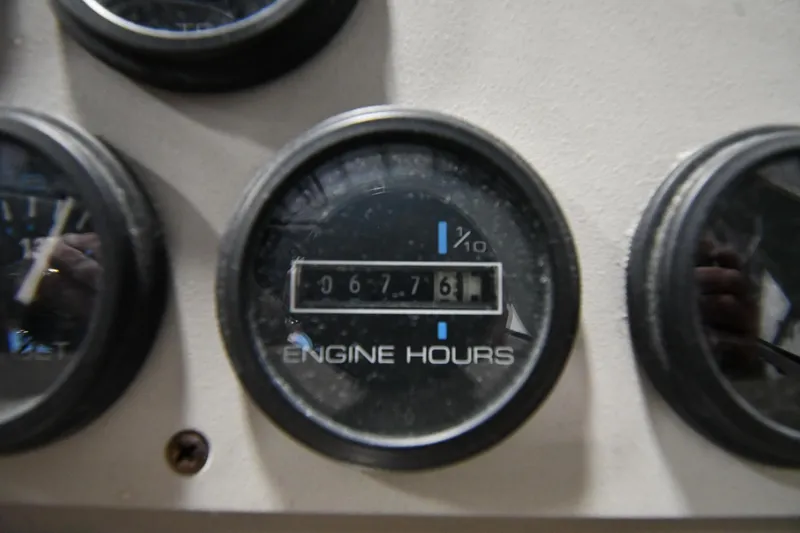 Slide: The Image of Engine hours gauge on 2000 Carver 350 Mariner, displaying 6761 hours. - 16