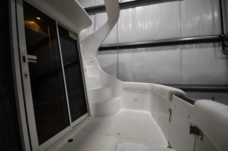 Slide: The Image of 2000 Carver 350 Mariner yacht interior with stairs and sliding glass doors. - 20