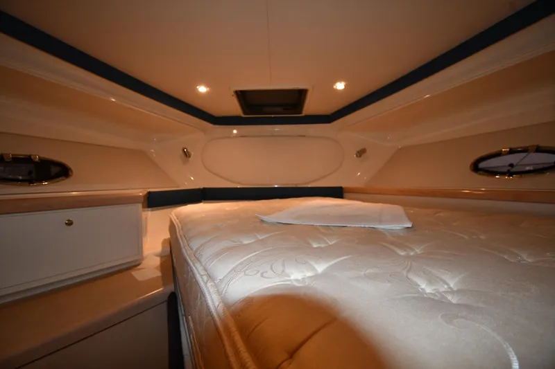 Slide: The Image of Interior cabin of 2000 Carver 350 Mariner yacht with bed and storage. - 28