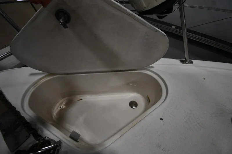 Slide: The Image of Open storage compartment on 2000 Carver 350 Mariner boat deck. - 4