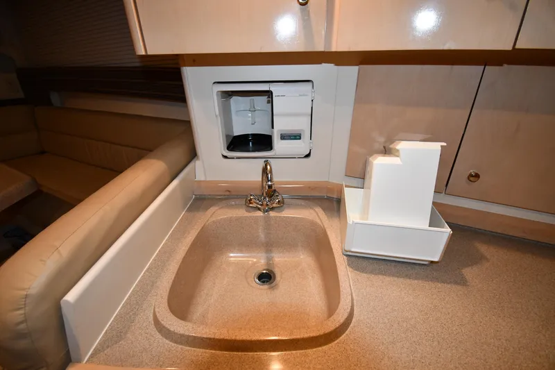 Slide: The Image of Interior of 2000 Carver 350 Mariner showing kitchen sink and countertop. - 47