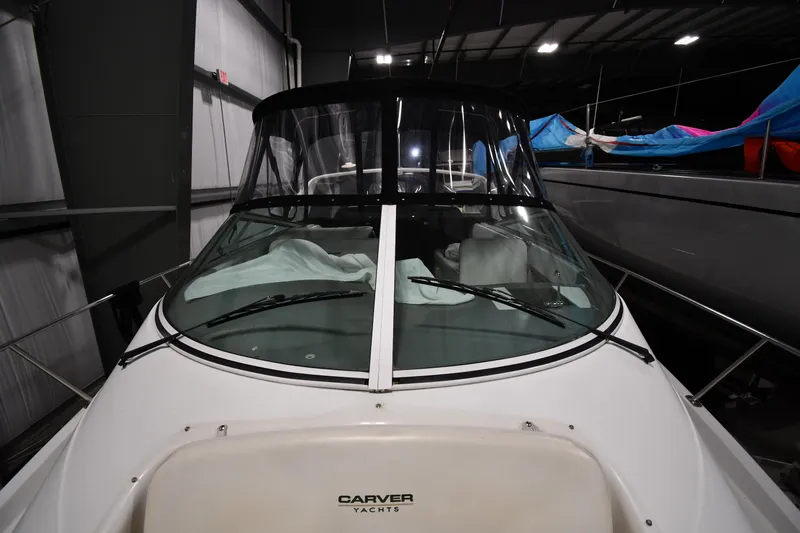 Slide: The Image of 2000 Carver 350 Mariner yacht in storage, front view with covered cockpit. - 5
