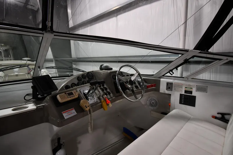 Slide: The Image of Interior helm of 2000 Carver 350 Mariner yacht with steering wheel and controls. - 7