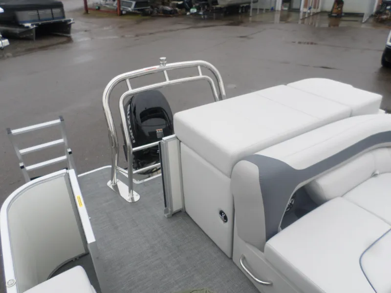 Slide: The Image of 2025 Godfrey Sweetwater 2086 CSE pontoon boat with white seating and rear motor view. - 3