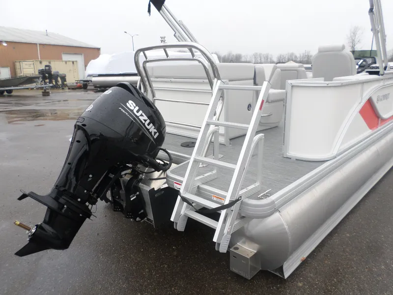 Slide: The Image of 2025 Godfrey Sweetwater 2086 CSE pontoon boat with Suzuki outboard motor and boarding ladder. - 4