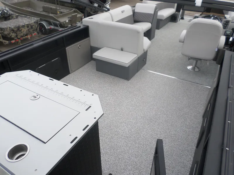 Slide: The Image of 2025 Angler Quest 8524 Family Fish boat interior with seating and fishing station. - 3