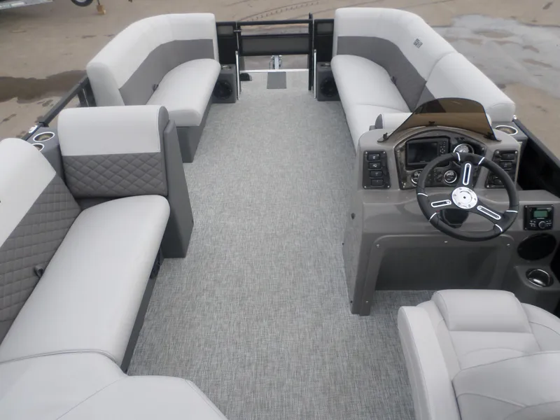 Slide: The Image of 2025 Angler Quest 8524 Family Fish boat interior with spacious seating and modern helm. - 5