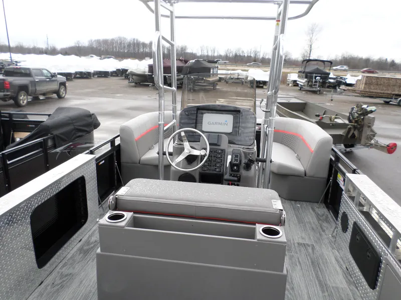 Slide: The Image of 2024 Angler Quest 8522/24 Pro Fish N Cruise boat interior with Garmin navigation system. - 4