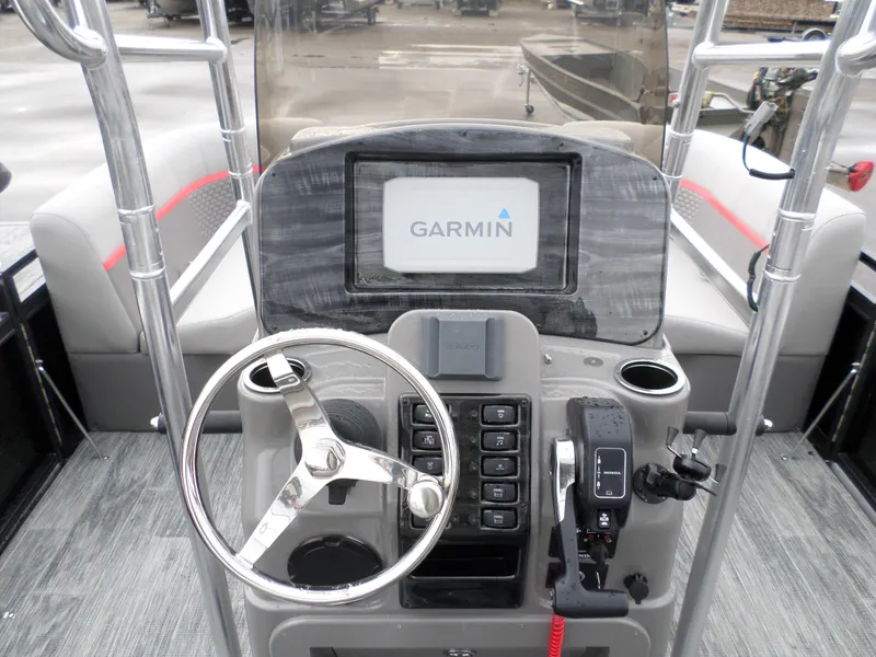 Slide: The Image of 2024 Angler Quest 8522/24 Pro Fish N Cruise boat dashboard with Garmin display. - 5