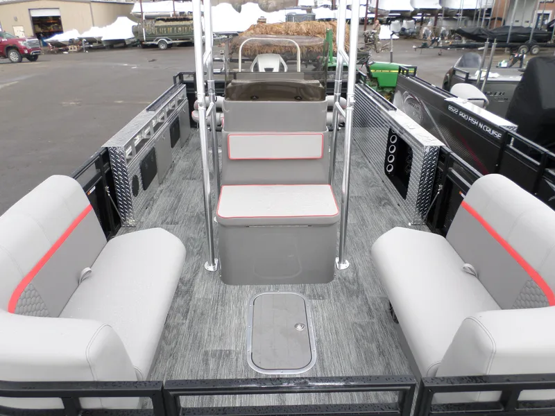 Slide: The Image of 2024 Angler Quest 8522/24 Pro Fish N Cruise interior with seating and fishing setup. - 7