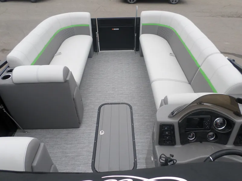 Slide: The Image of 2023 Apex Qwest 822 XRE Cruise LT TRI pontoon boat interior with spacious seating and modern dashboard. - 5