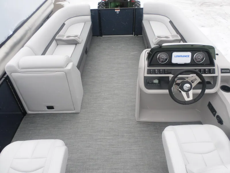 Slide: The Image of 2025 Godfrey Sweetwater 2286SB Tri pontoon boat interior with modern helm and seating. - 3