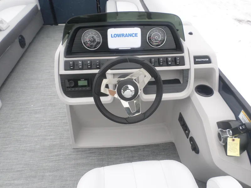 Slide: The Image of Steering console of 2025 Godfrey Sweetwater 2286SB Tri pontoon boat with Lowrance display. - 6